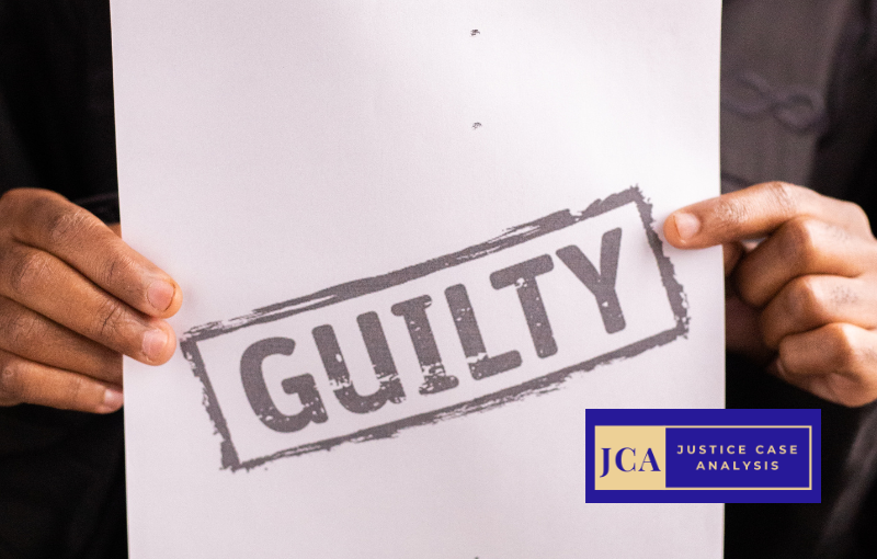 Guilty sign held by two hands