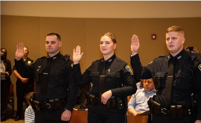 Kelly Dever taking her oath with Boston Police