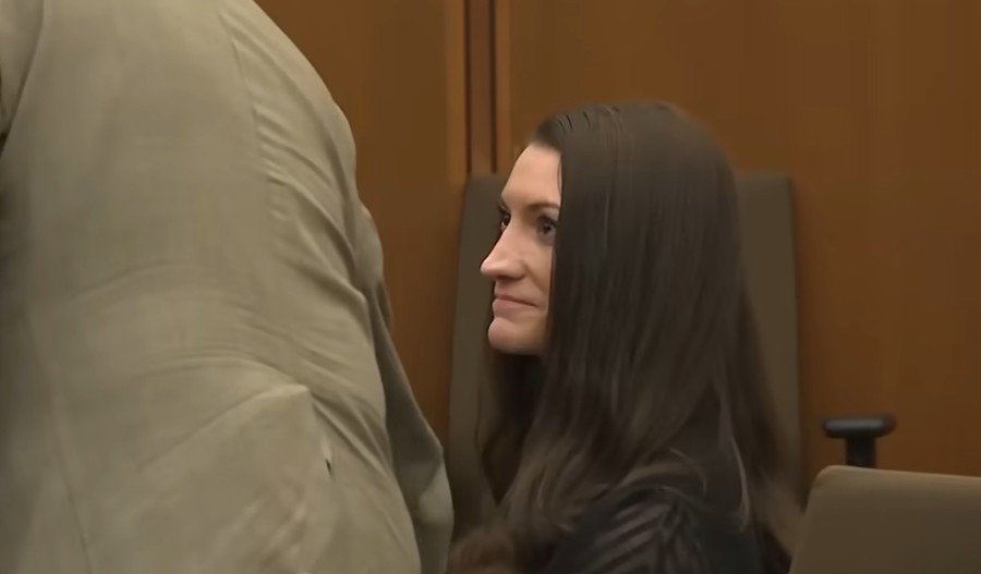 Lindsay Clancy smiles at defense attorney at June 18, 2026 pretrial hearing. 
